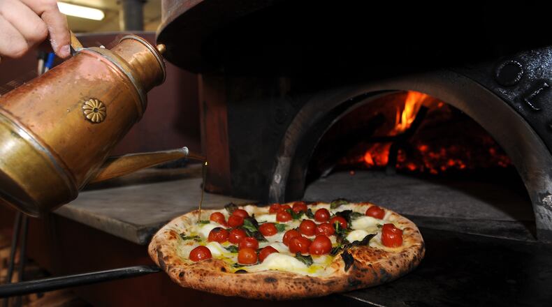 Pomodorini pizza with fresh cherry tomato, bufala, garlic and basil at Antico Pizza Napoletana. (BECKY STEIN)