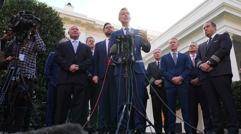 FILE - Transportation Secretary Sean Duffy speaks to the media alongside President of the International Brotherhood of Teamsters Sean O'Brien, President and CEO of Airlines for America Chris Sununu, Vice President JD Vance and aviation industry representatives about the impact of the government shutdown on the aviation industry outside of the West Wing of the White House, Oct. 30, 2025, in Washington. (AP Photo/Jacquelyn Martin, File)