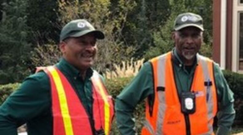 Berkeley Lake’s City Marshal, Gene Rodgers (shown on right) will retire at the end of this year after 12 years of service. Robert Adderly (l), who has been working with Rodgers, will take over as City Marshal. Courtesy City of Berkeley Lake