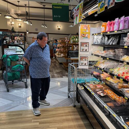 A customer shops at a grocery store in Arlington Heights, Ill., Monday, July 6, 2026. (AP Photo/Nam Y. Huh)