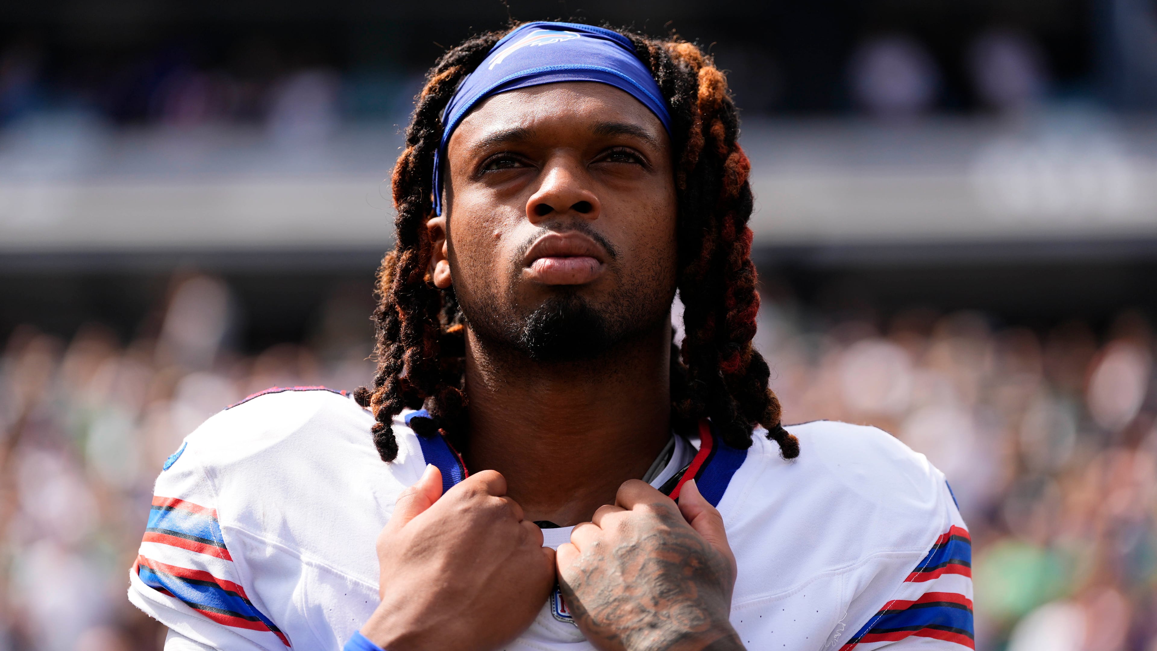 Buffalo Bills safety Damar Hamlin (3) stands for the national anthem before playing against the New York Jets in an NFL football game, Sunday, Sept. 14, 2025, in East Rutherford, N.J. (AP Photo/Yuki Iwamura)