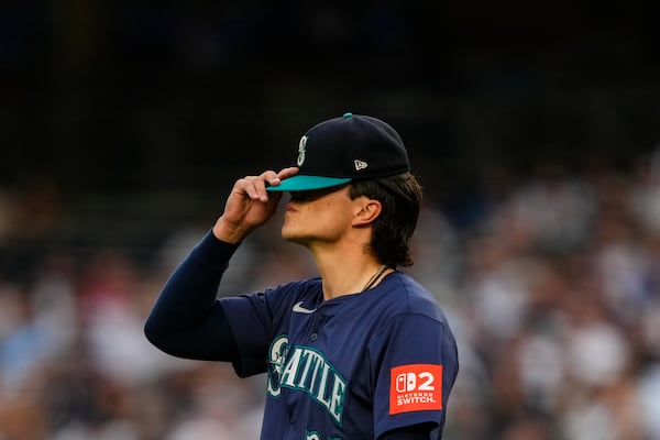 Seattle Mariners pitcher Bryan Woo (22) gets ready to pitch during the first inning of a baseball game against the New York Yankees, Thursday, July 10, 2025, in New York. (AP Photo/Yuki Iwamura)