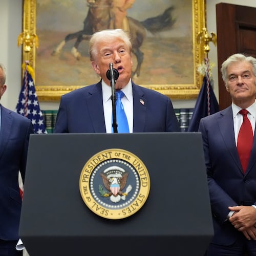 President Donald Trump speaks inside the Roosevelt Room of the White House on Monday, Sept. 22, 2025, in Washington, D.C., as Health and Human Services Secretary Robert F. Kennedy Jr. (left) and Centers for Medicare and Medicaid Services administrator Dr. Mehmet Oz listen. (Mark Schiefelbein/AP)