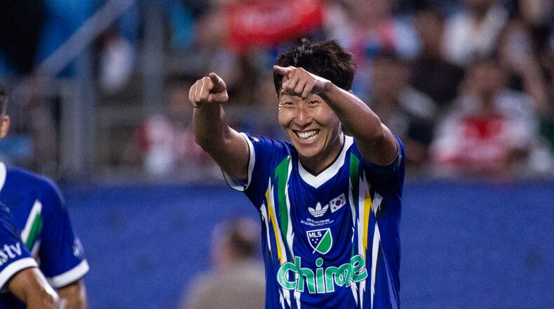 MLS All-Star Son Heung-min (7) celebrates after scoring during the MLS All-Star soccer game Wednesday, July 29, 2026, in Charlotte, N.C. (AP Photo/Scott Kinser)