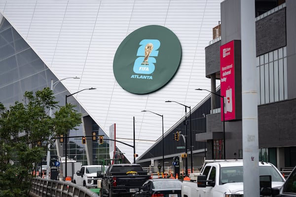 A FIFA 2026 logo replaces the Mercedes logo on Mercedes-Benz Stadium in compliance with FIFA's "clean stadium" rules on Tuesday, Apr 28, 2026. (Ben Hendren for the AJC)