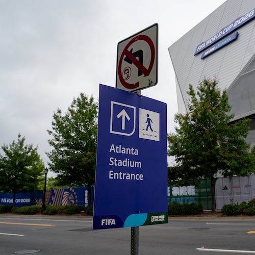 New signage is placed Monday, June 8, 2026, outside of Mercedes-Benz Stadium, which will be called Atlanta Stadium during the FIFA World Cup. (Ben Hendren for the AJC)