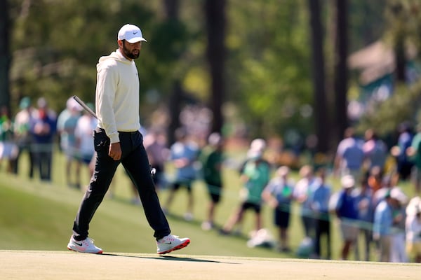 Scottie Scheffler walks across the third green during a practice round at the Masters golf tournament, Tuesday, April 8, 2025, in Augusta, Ga. (AP Photo/Ashley Landis)