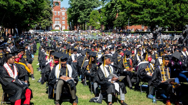 Graduates and family fill the Century Campus at Morehouse College during the 137th commencement that celebrates the classes of 2020 and 2021 on Sunday, May 16, 2021. Morehouse will clear outstanding balances for students covering each semester since the start of the pandemic. (Photo: Steve Schaefer for The Atlanta Journal-Constitution)