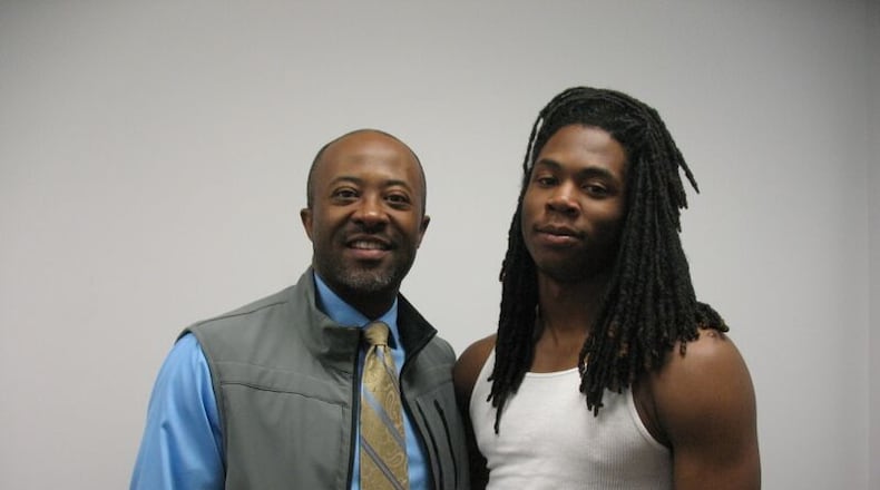 Corey Wimberly (left), a detective in St. Charles County, served as a mentor for Juwuan Briscoe after he got off track as a high school sophomore. (AJC / CHIP TOWERS)