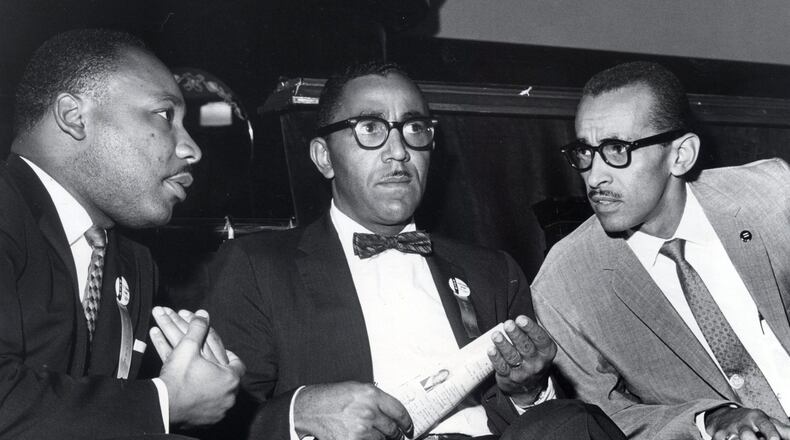 In a Sept. 25, 1963 photo, The Rev. Martin Luther King,Jr., left, Joseph E. Lowery, and Wyatt Tee Walker, right, executive director of the SCLC, meet at First African Baptist Church, for the SCLC convention in Richmond, Va. The Rev. Wyatt Tee Walker, who helped assemble the Rev. Martin Luther King Jr.’s famous “Letter From Birmingham Jail” from notes the incarcerated King wrote on paper scraps and newspaper margins, died Tuesday morning, Jan. 23, 2018, in Chester, Va., said his daughter Patrice Walker Powell. He was either 88 or 89. Family records showed different years of birth, said Powell, who confirmed his death.