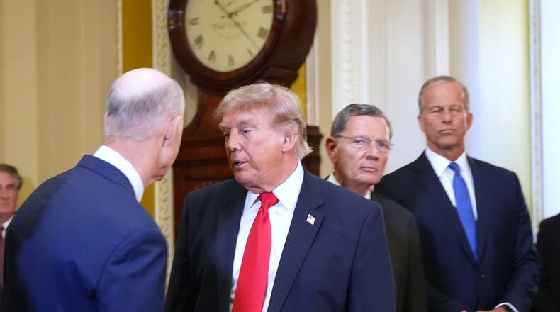President Donald Trump turns to depart after speaking with reporters as Sen. Rick Scott, R-Fla., from left, Sen. John Barrasso, R-Wyo., and Senate Majority Leader John Thune, R-S.D., listen on Capitol Hill, Wednesday, June 24, 2026, in Washington. (AP Photo/Jacquelyn Martin)