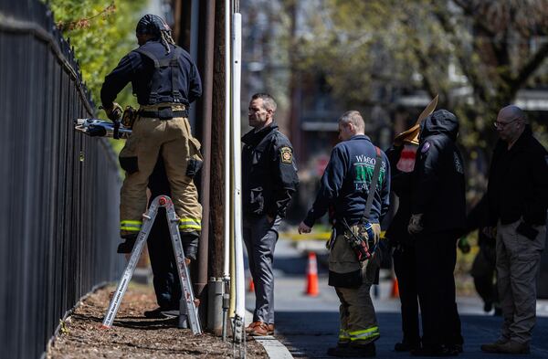 Police investigate Gov. Josh Shapiro's residence after someone set fire to the building on Sunday, April 13, 2025 in Harrisburg, Pa. (Sean Simmers/The Patriot-News via AP)