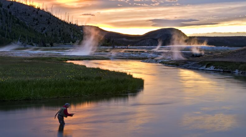 In an undated handout photo, fishing on the Madison River in Montana. Firehole Ranch offers deluxe Western cabins and convenient access to the equally sought after West Yellowstone, Gallatin and Firehole rivers. (Rowan Nyman via The New York Times)