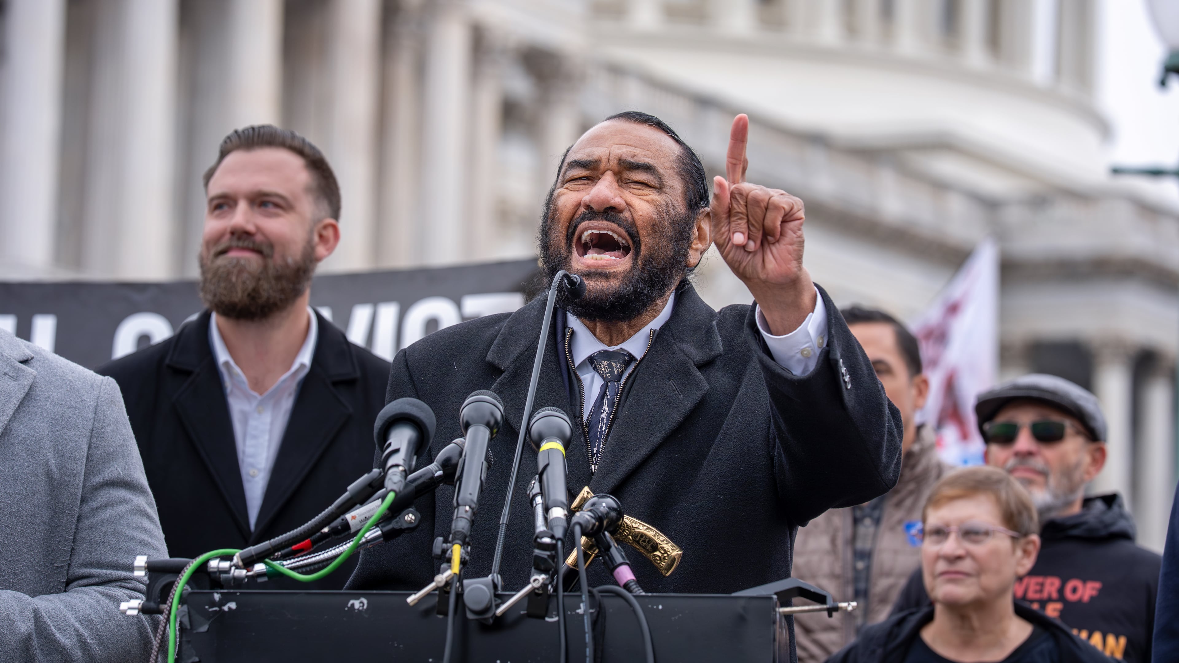 Rep. Al Green, D-Texas, joins activists demonstrating against the policies and conduct of President Donald Trump where he hints the possibility of bringing articles of impeachment against as he did in 2017, at the Capitol in Washington, Thursday, Nov. 20, 2025. (AP Photo/J. Scott Applewhite)