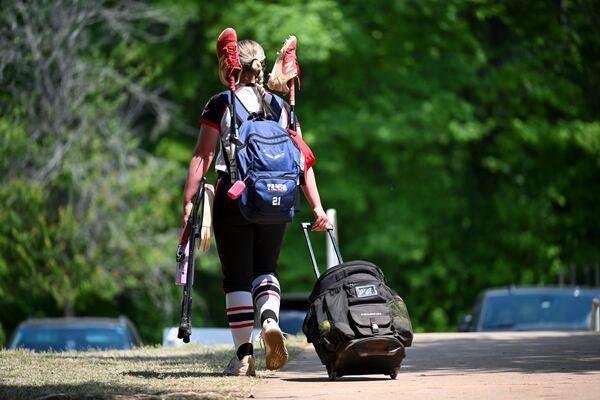 A Cherokee player heads home after losing 8-7 to Creekview in a GHSA championship slow-pitch softball game Thursday, April 23, 2026. This was the final state championship game, at least in the foreseeable future, in slow-pitch softball. (Daniel Varnado for the AJC)