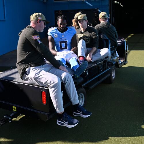 Tennessee Titans wide receiver Calvin Ridley is taken off the field after being injured during the first half of an NFL football game against the Houston Texans on Sunday, Nov. 16, 2025, in Nashville, Tenn. (AP Photo/John Amis)