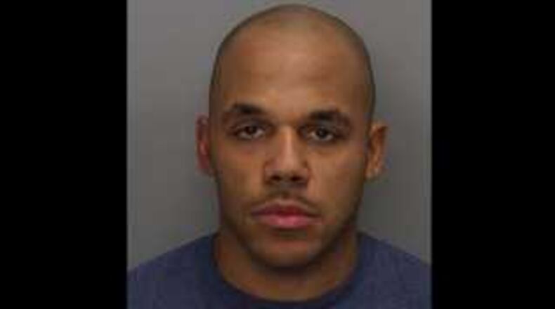 Atlanta Officer Theodore Travis was arrested and accused of driving drunk Sunday along Lost Mountain and Macland roads. (Credit: Channel 2 Action News)