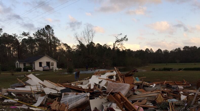 Wreckage of the mobile home in which an elderly married couple were found dead near Barney, Ga., after Sunday’s violent storms. Hard hit South Georgia is in need of money, essential items and volunteers. Photo Joshua Sharpe / AJC