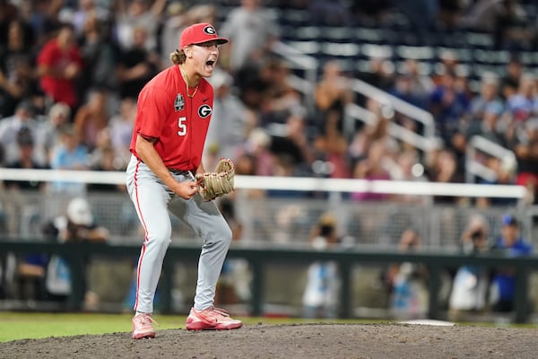 Georgia pitcher Justin Byrd celebrates Tuesday night’s College World Series win over Texas. (Vera Nieuwenhuis/AP)