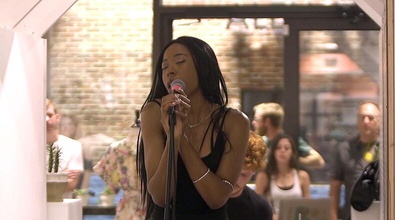 Chrystele during a Sofar Sounds performance in a Ponce City Market boutique.