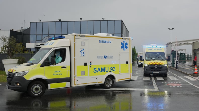 Ambulances carrying patients evacuated from the MV Hondius cruise ship with suspected hantavirus infection, leave the Bourget airport, north of Paris, Sunday, May 10, 2026. (AP Photo/Thibault Camus)