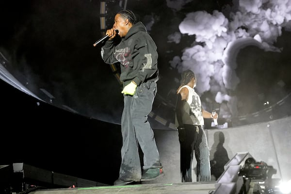 Special guest, Travis Scott, left, performs with Young Thug during the Summer Smash Music Festival on Sunday, June 22, 2025, in Bridgeview, Ill. (Photo by Rob Grabowski/Invision/AP)