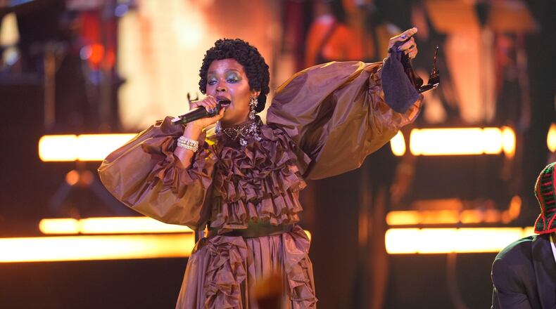Lauryn Hill accepts the living legend icon award during the BET Awards on Sunday, June 28, 2026, at the Peacock Theater in Los Angeles. (AP Photo/John Locher)