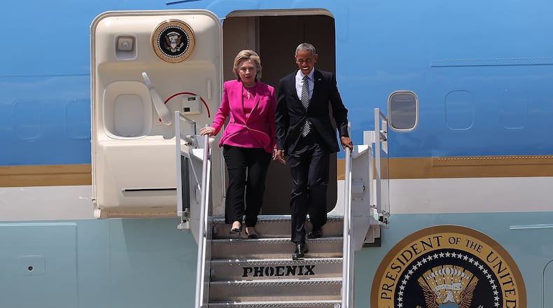 CHARLOTTE, NC - JULY 05: Democratic presidential candidate former Secretary of State Hillary Clinton walks off of Air Force One with U.S. president Barack Obama on July 5, 2016 in Charlotte, North Carolina. Hillary Clinton is campaigning with president Obama in North Carolina. (Photo by Justin Sullivan/Getty Images)