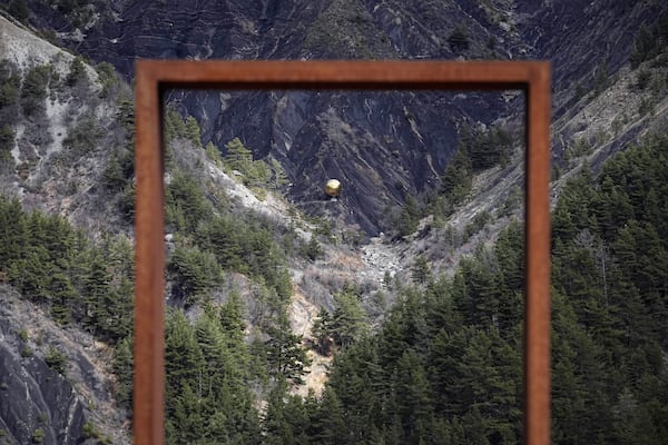 View of the Germanwings plane crash site, just 10 years after the crash, Monday, March 24, 2025 in the French Alps, near Le Vernet, southern France. (AP Photo/Laurent Cipriani)