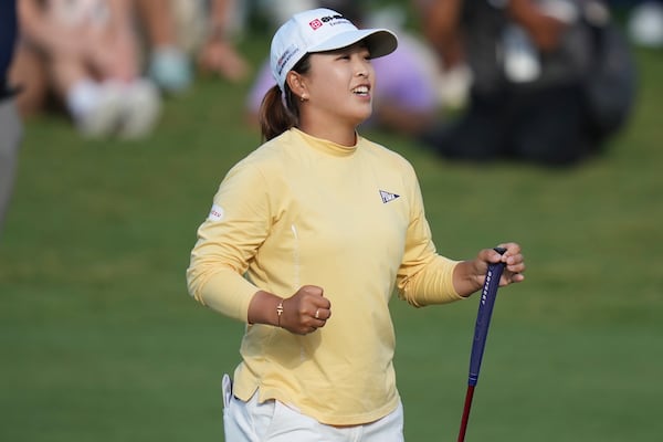Mao Saigo, of Japan, celebrates her win during a playoff round of the Chevron Championship LPGA golf tournament Sunday, April 27, 2025, in The Woodlands, Texas. (AP Photo/Eric Gay)