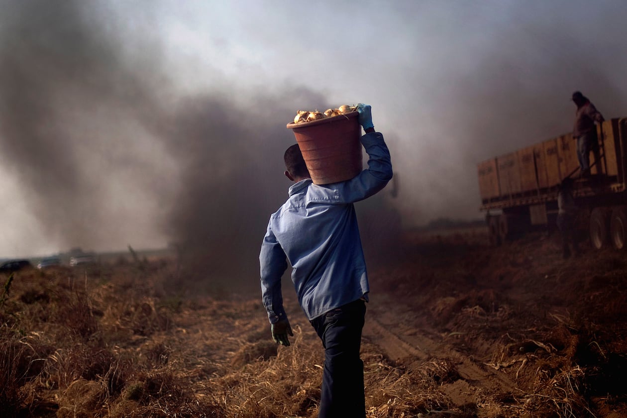 An indictment unsealed this week describes a conspiracy to exploit migrant farmworkers in Georgia. (David Goldman/AP)