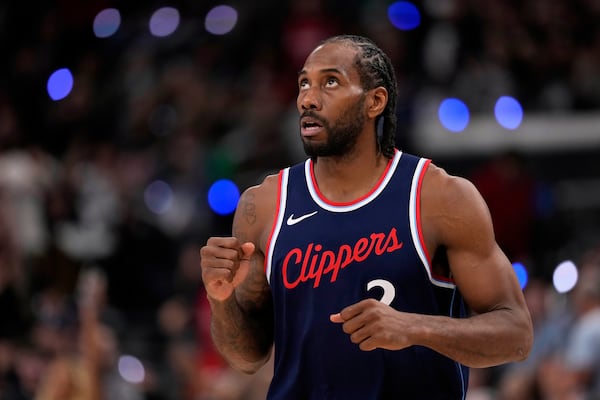 Los Angeles Clippers forward Kawhi Leonard celebrates after scoring during the second half in Game 6 of an NBA basketball first-round playoff series against the Denver Nuggets, Thursday, May 1, 2025, in Inglewood, Calif. (AP Photo/Mark J. Terrill)