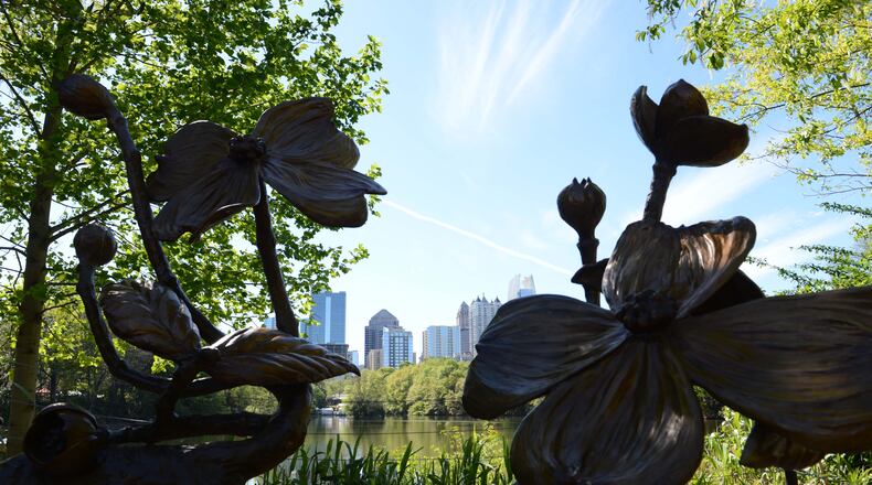 While real dogwoods aren't in bloom in August in Atlanta, this sculpture in Piedmont Park ensures there are some blossoms for the Atlanta Dogwood Festival to be held Aug. 6-Aug. 8. The pandemic forced the festival this year to be rescheduled from its usual time in April.