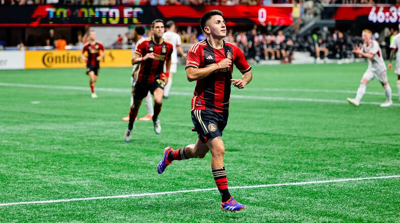 Atlanta United midfielder Thiago Almada #10 celebrates after scoring a goal during the match against the Toronto FC at Mercedes-Benz Stadium in Atlanta, GA on Saturday June 29, 2024. (Photo by Alex Sl