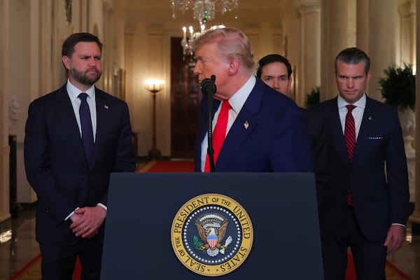 President Donald Trump turns from the podium after speaking from the East Room of the White House in Washington, Saturday, June 21, 2025, after the U.S. military struck three Iranian nuclear and military sites, directly joining Israel's effort to decapitate the country's nuclear program, as Vice President JD Vance, Secretary of State Marco Rubio and Defense Secretary Pete Hegseth listen. (Carlos Barria/Pool via AP)
