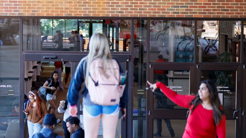 Students are seen entering and leaving the Tate Student Center on the University of Georgia campus on Monday, Sept. 8, 2025. State data released Tuesday shows that the rate of international students enrolling in Georgia’s public universities dropped dramatically this semester. (Miguel Martinez/AJC)