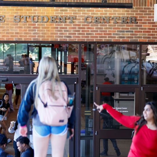 Students are seen entering and leaving the Tate Student Center on the University of Georgia campus on Monday, Sept. 8, 2025. State data released Tuesday shows that the rate of international students enrolling in Georgia’s public universities dropped dramatically this semester. (Miguel Martinez/AJC)