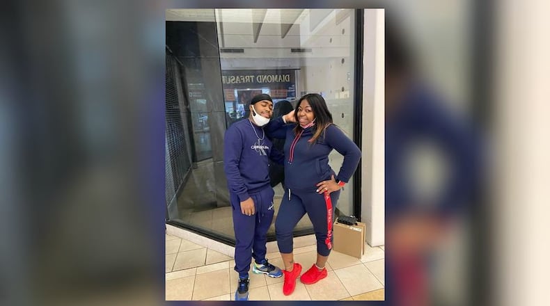 Corey Jackson (left) and his mother Queshon Walker smile for a photo.