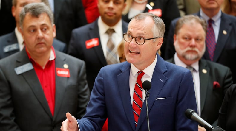 3/6/18 - Atlanta - Lt. Gov. Casey Cagle, surrounded by supporters, addresses the media after he qualified to run for governor this afternoon.  Qualifying for Georgia's 2018  elections began Monday and runs through Friday.  Georgia has races for Governor, Lieutenant Governor and other statewide posts, and every congressional seat nationwide is up for a vote in November.  BOB ANDRES  /BANDRES@AJC.COM