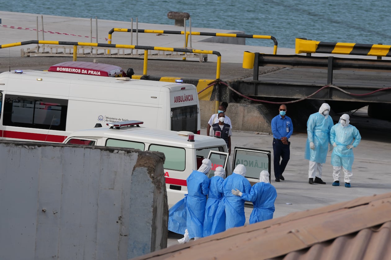Health workers in protective gear evacuate patients from the MV Hondius cruise ship at a port in Praia, Cape Verde, Wednesday, May 6, 2026. (Misper Apawu/AP)
