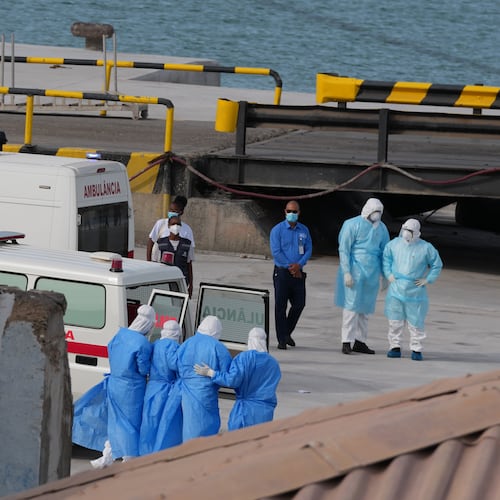 Health workers in protective gear evacuate patients from the MV Hondius cruise ship at a port in Praia, Cape Verde, Wednesday, May 6, 2026. (Misper Apawu/AP)