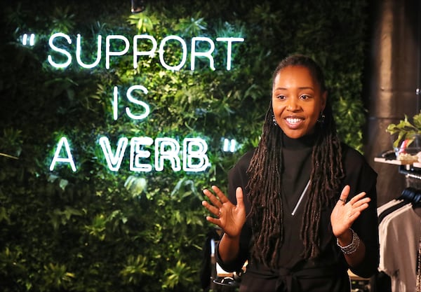 Owner Lakeysha Hallmon discusses the concept of her store The Village at Ponce City Market with a large tag line to the community prominently displayed on one of the main walls on Monday, Nov 23, 2020, in Atlanta.   “Curtis Compton / Curtis.Compton@ajc.com”