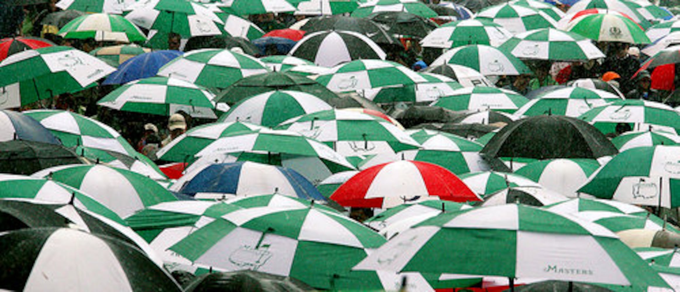 Umbrellas fill Augusta National