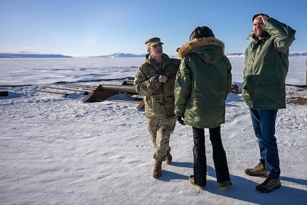 Vice President JD Vance and second lady Usha Vance, center, tour the U.S. military's Pituffik Space Base in Greenland, Friday, March 28, 2025. (Jim Watson/Pool via AP)