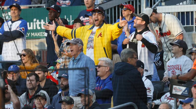 Fans are not happy as Ozzie Albies is thrown out trying to steal second during Saturday's Game 1 of the NLDS against the Phillies at Truist Park. (Miguel Martinez / Miguel.Martinezjimenez@ajc.com)