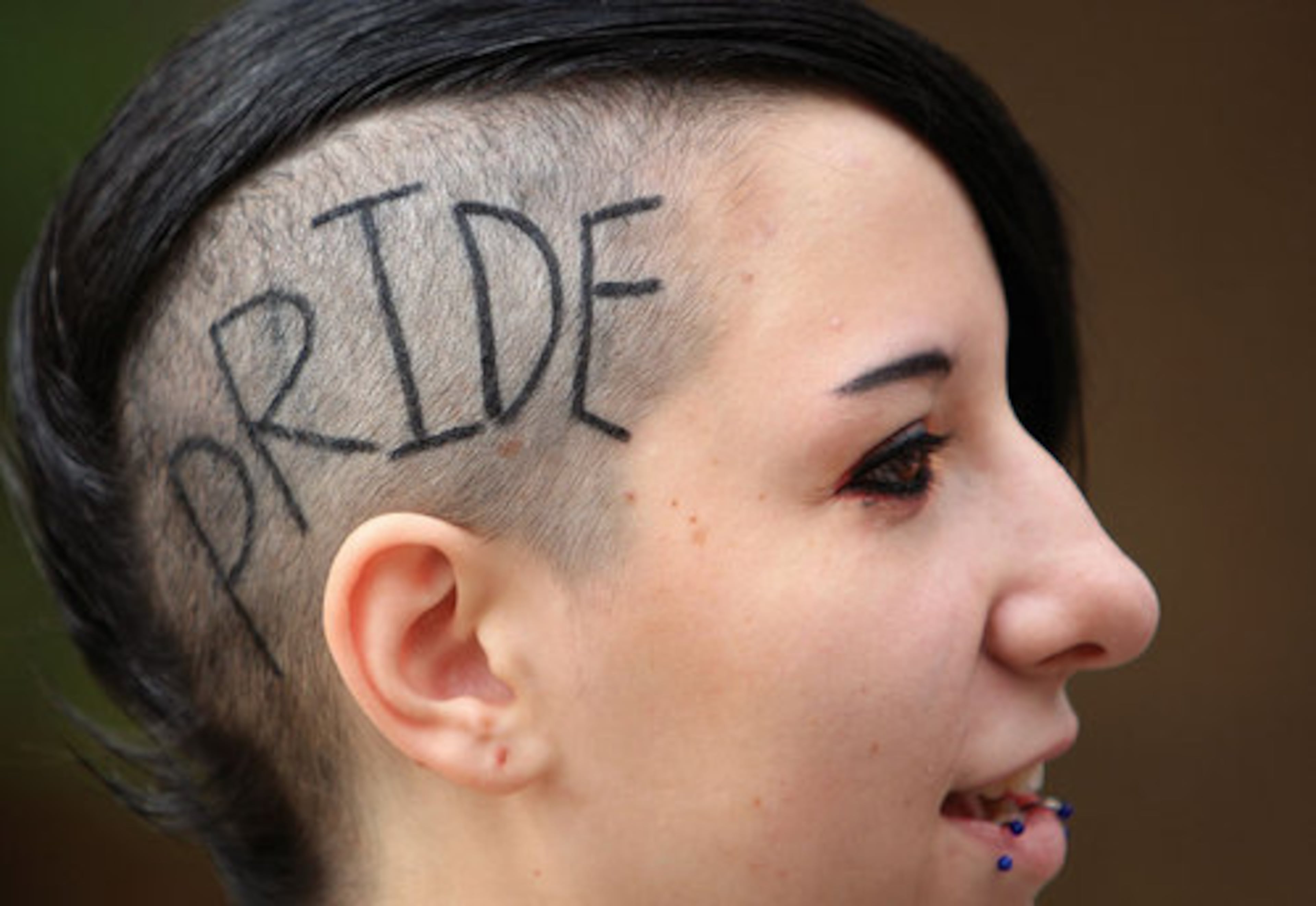 Darian Licone of Lilburn, sports her "Pride" as she attends the annual Atlanta Pride Parade on Oct. 9, 2011.
