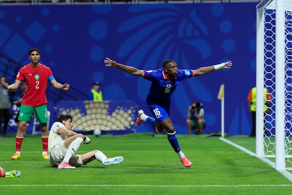 Haiti's Lenny Joseph (right) scores past Morocco goalkeeper Yassine Bounou (center) and Morocco's Achraf Hakimi during their World Cup match at Atlanta Stadium on Wednesday, June 24, 2026. (Jason Getz/AJC)