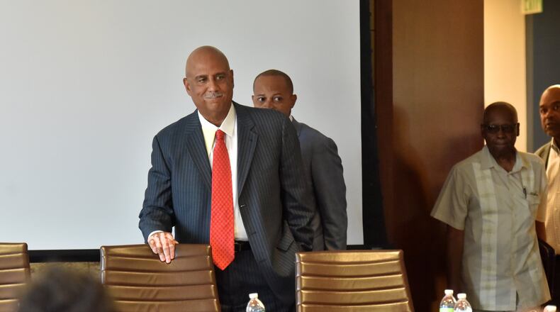 Christopher Edwards, chairman of the Atlanta Housing Authority board, at a board meeting last fall. “We want to get out of the lawsuit business,” he told the AJC Thursday. (Hyosub Shin / Hyosub.Shin@ajc.com)