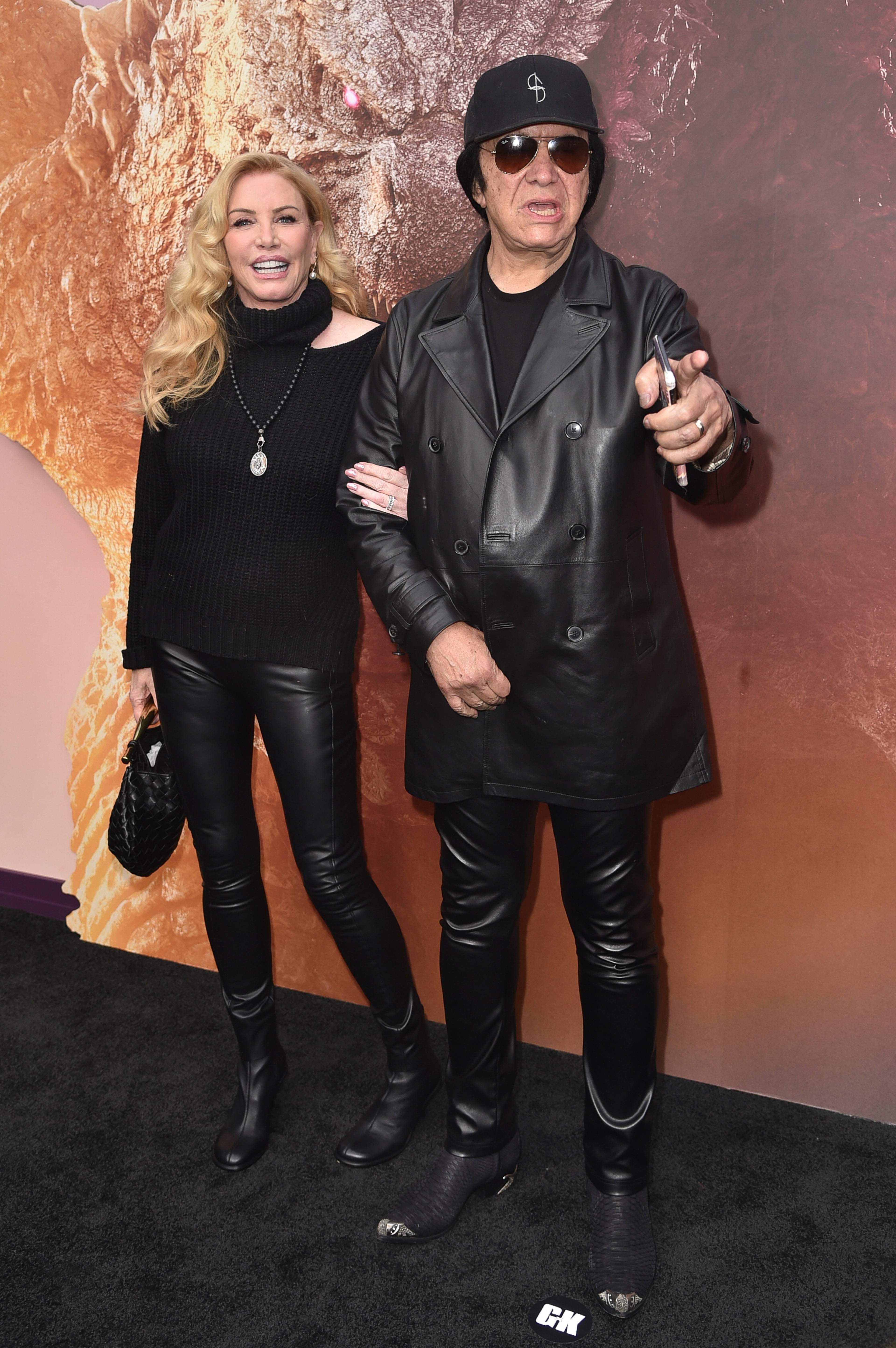 Gene Simmons (right) and wife Shannon Tweed arrive at the premiere of "Godzilla x Kong: The New Empire," March 25, 2024, in Los Angeles. (Richard Shotwell/Invision/AP)