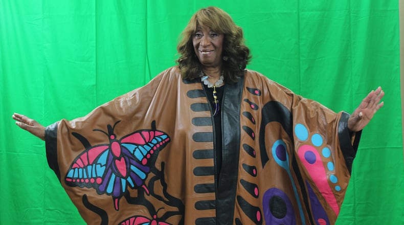 Bishop Barbara King models a piece from her line. HANDOUT